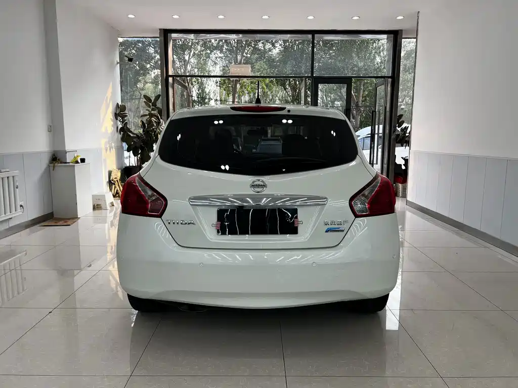 Nissan Tiida 2015 — фото 24