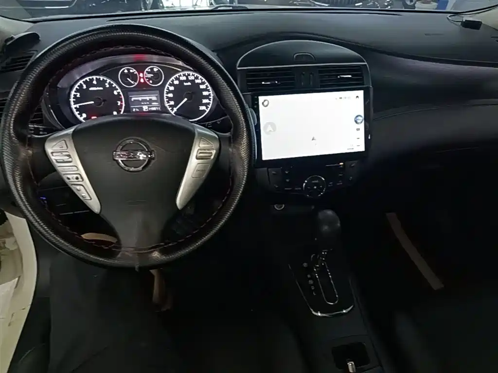 Nissan Tiida 2015 — фото 10