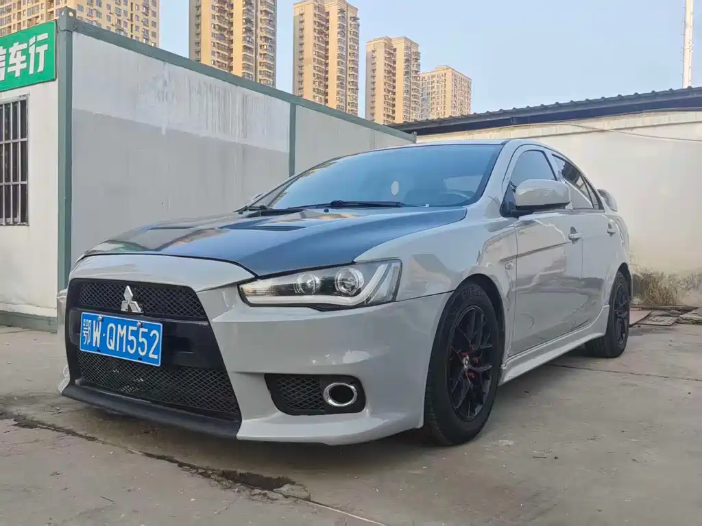 Mitsubishi Lancer EX 2013 — фото 1