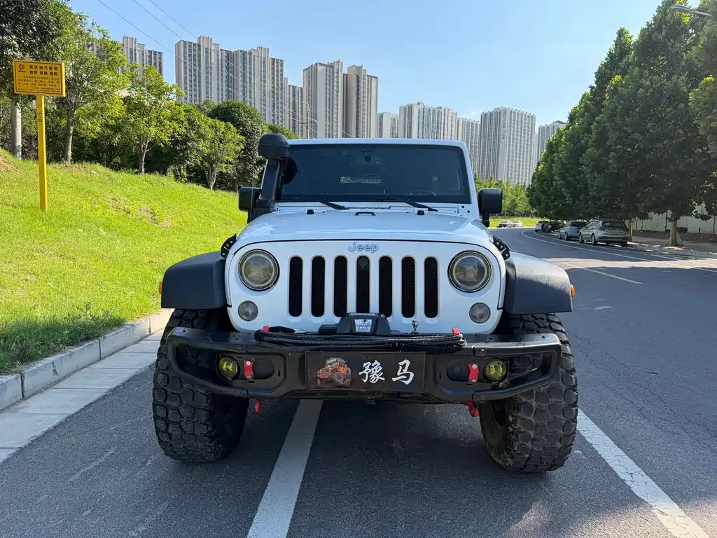 Jeep Wrangler 2014 — фото 2