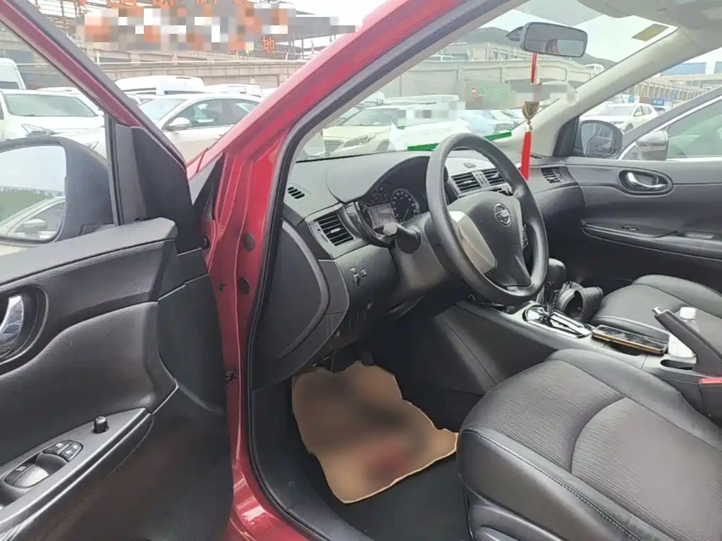 Nissan Tiida 2016 — фото 16