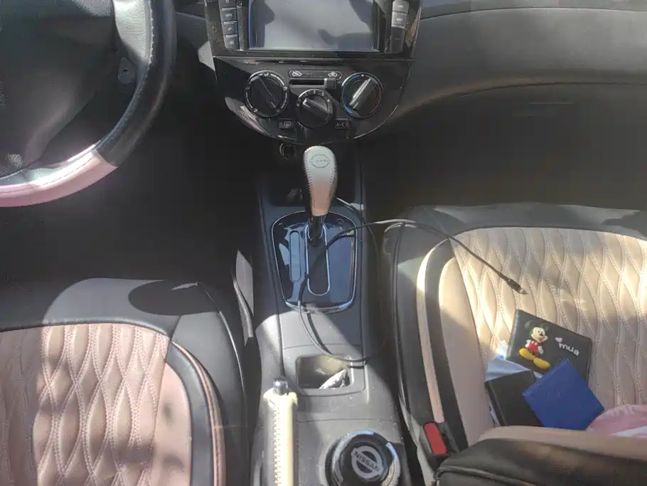 Nissan Tiida 2015 — фото 16