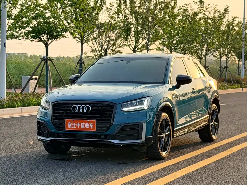 Audi Q2L 2021 — фото 1