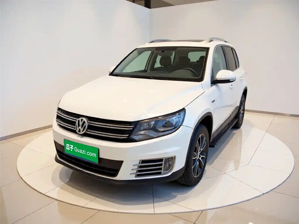 Volkswagen Tiguan 2014 — фото 1