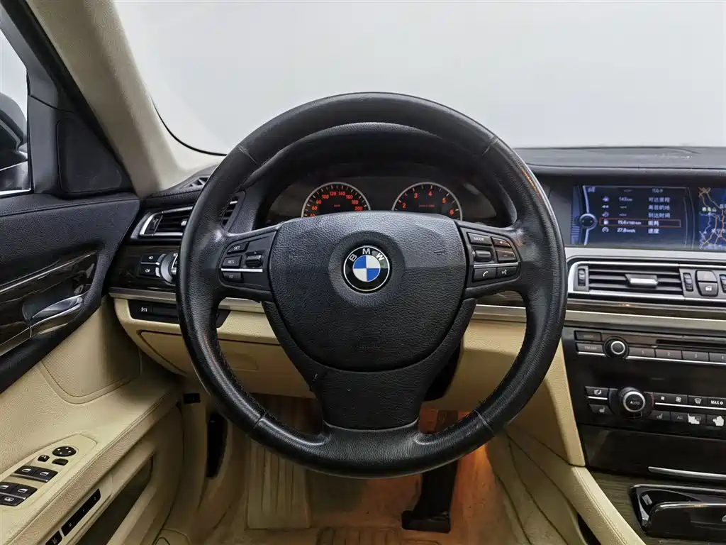 BMW 7 Series 2009 — фото 11