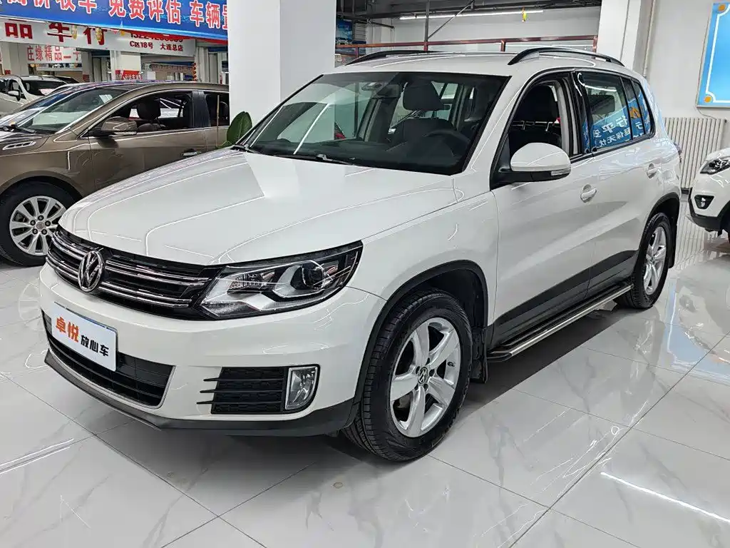 Volkswagen Tiguan 2014 — фото 1