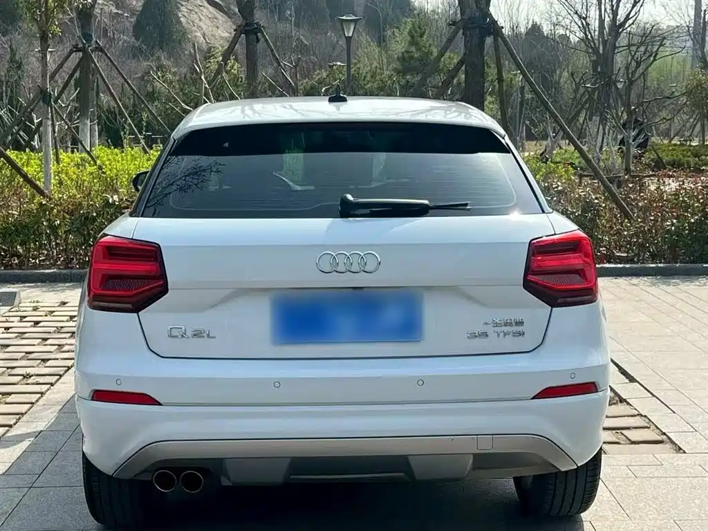 Audi Q2L 2021 — фото 14