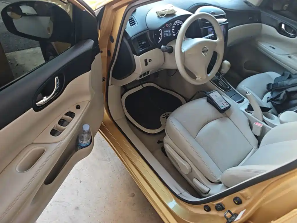 Nissan Tiida 2015 — фото 16