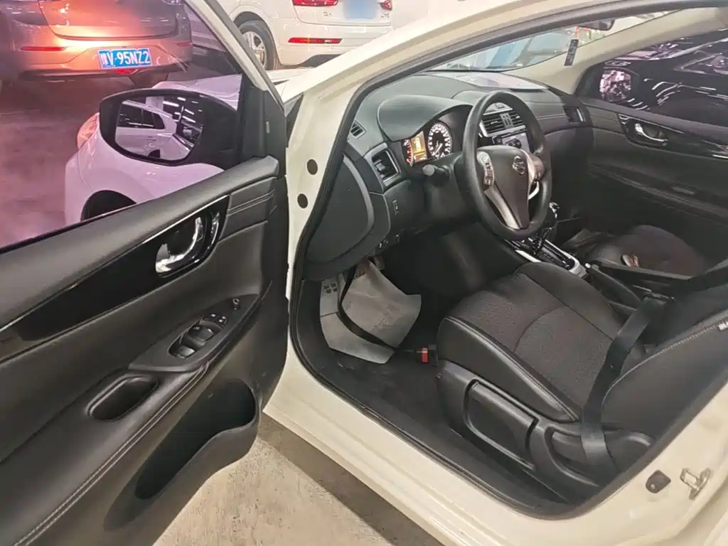 Nissan Tiida 2018 — фото 16