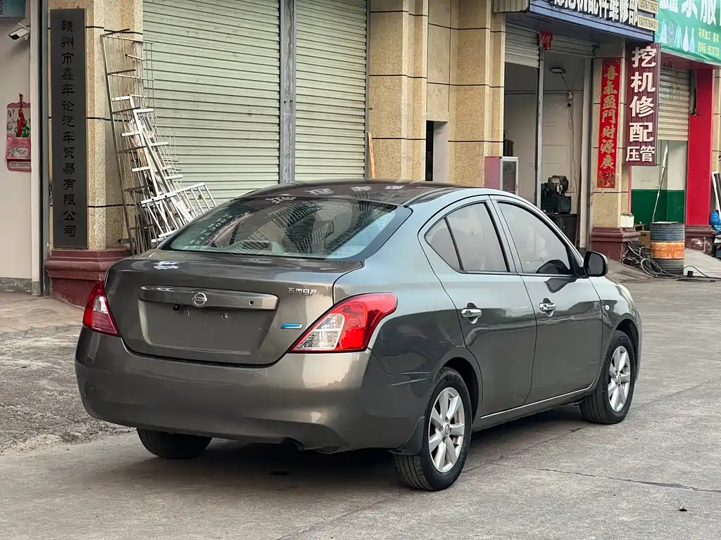 Nissan Sunny 2011 — фото 3