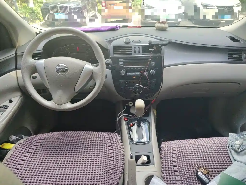 Nissan Tiida 2014 — фото 13