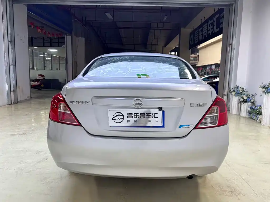 Nissan Sunny 2014 — фото 14