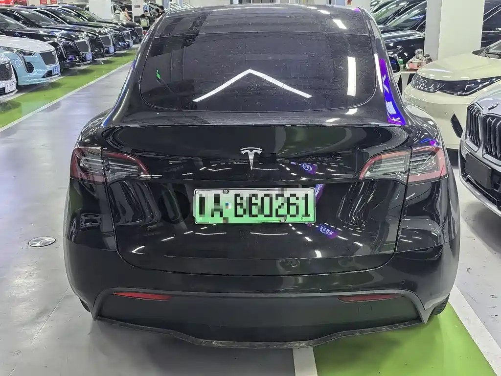 Tesla Model Y 2024 — фото 13