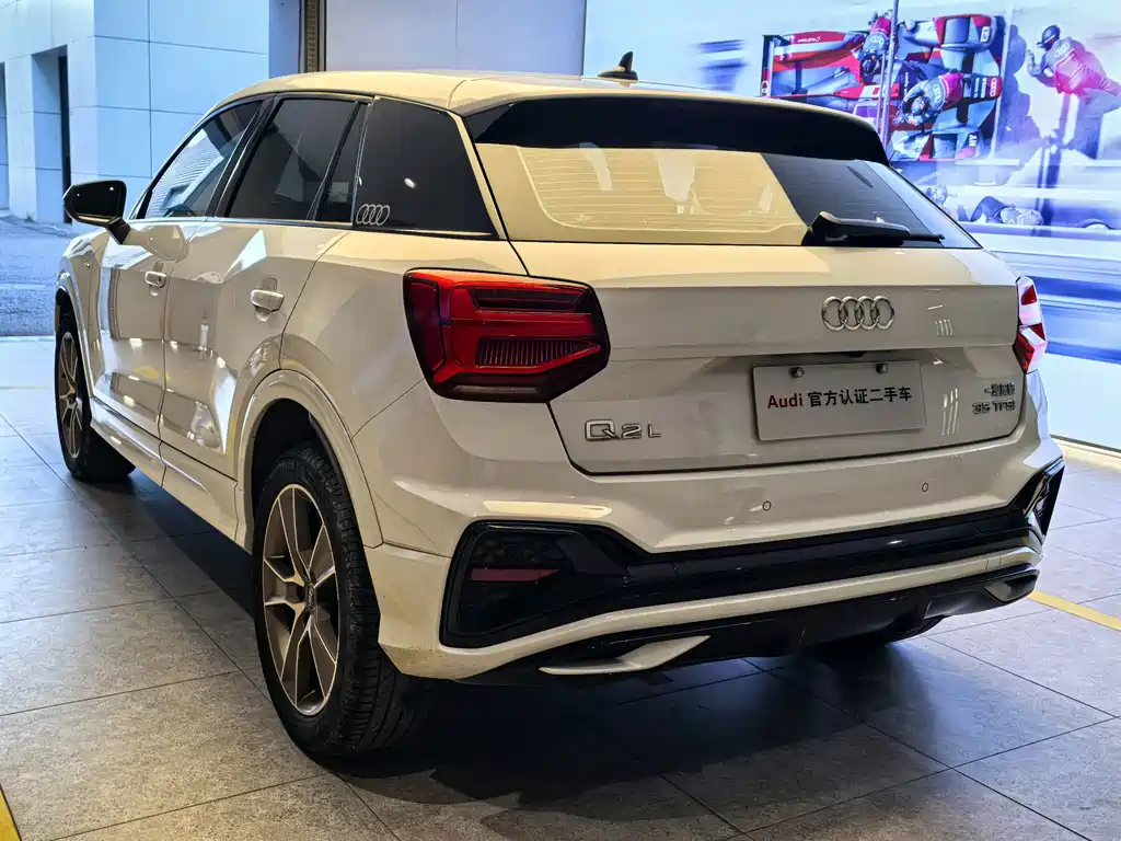 Audi Q2L 2023 — фото 6