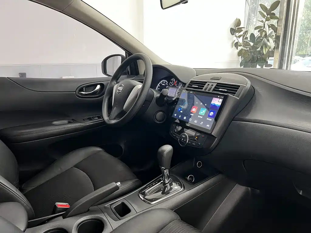 Nissan Tiida 2015 — фото 9