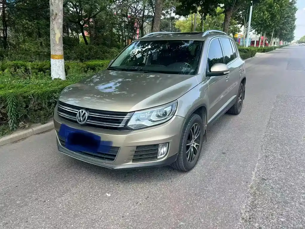 Volkswagen Tiguan 2014 — фото 1