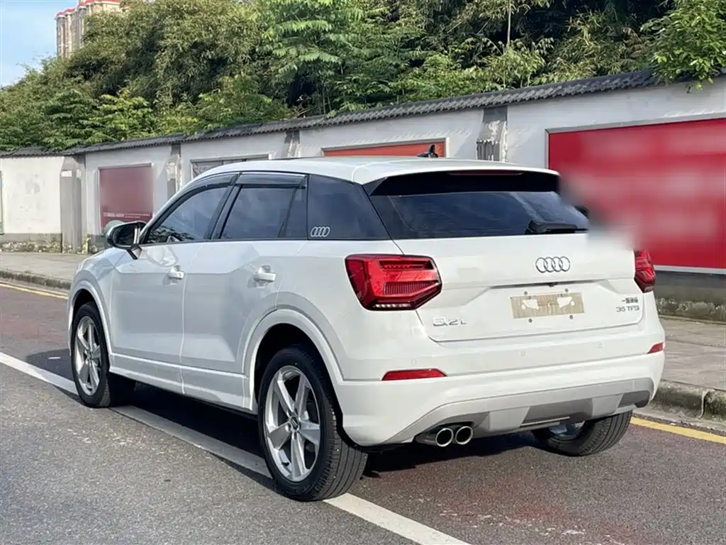 Audi Q2L 2021 — фото 11