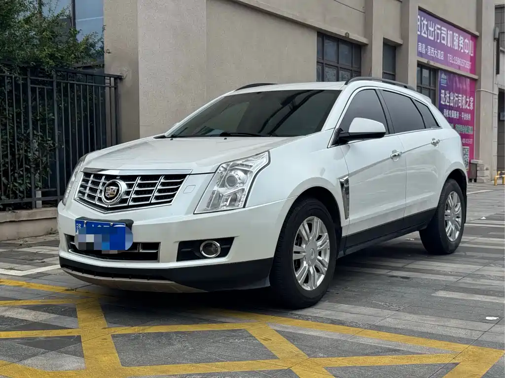 Cadillac SRX 2014 — фото 1