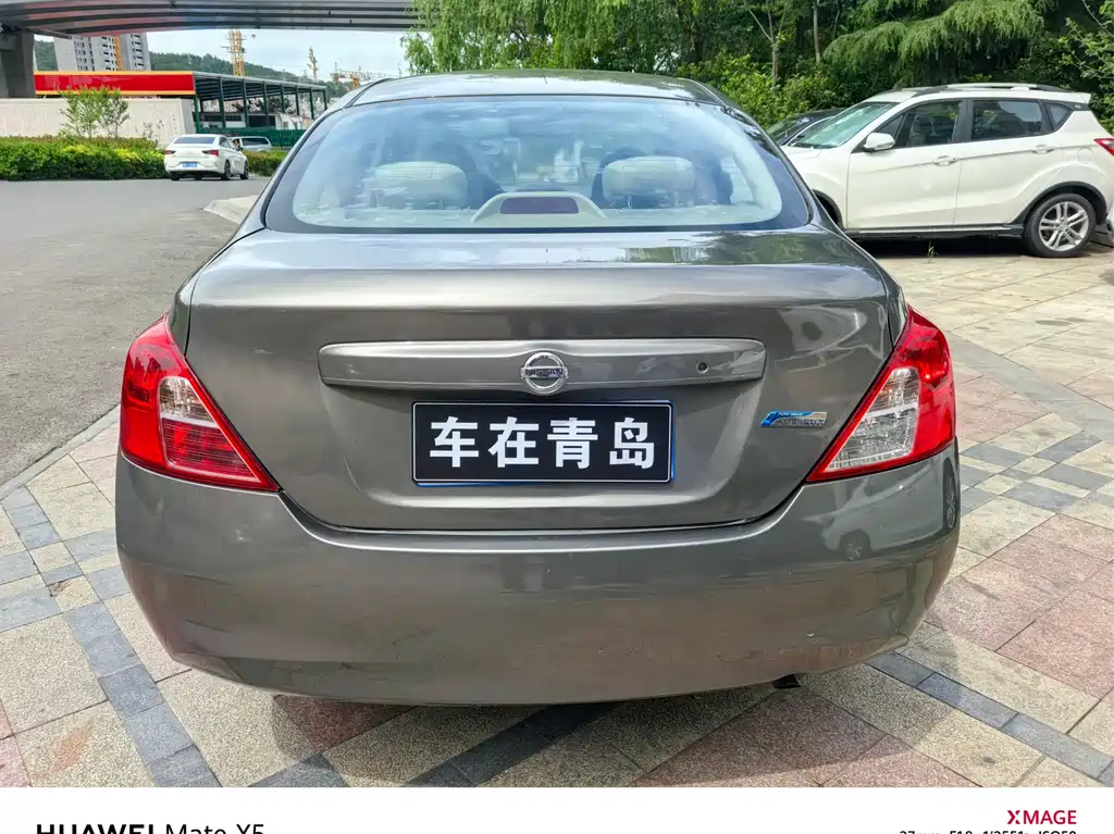 Nissan Sunny 2011 — фото 10