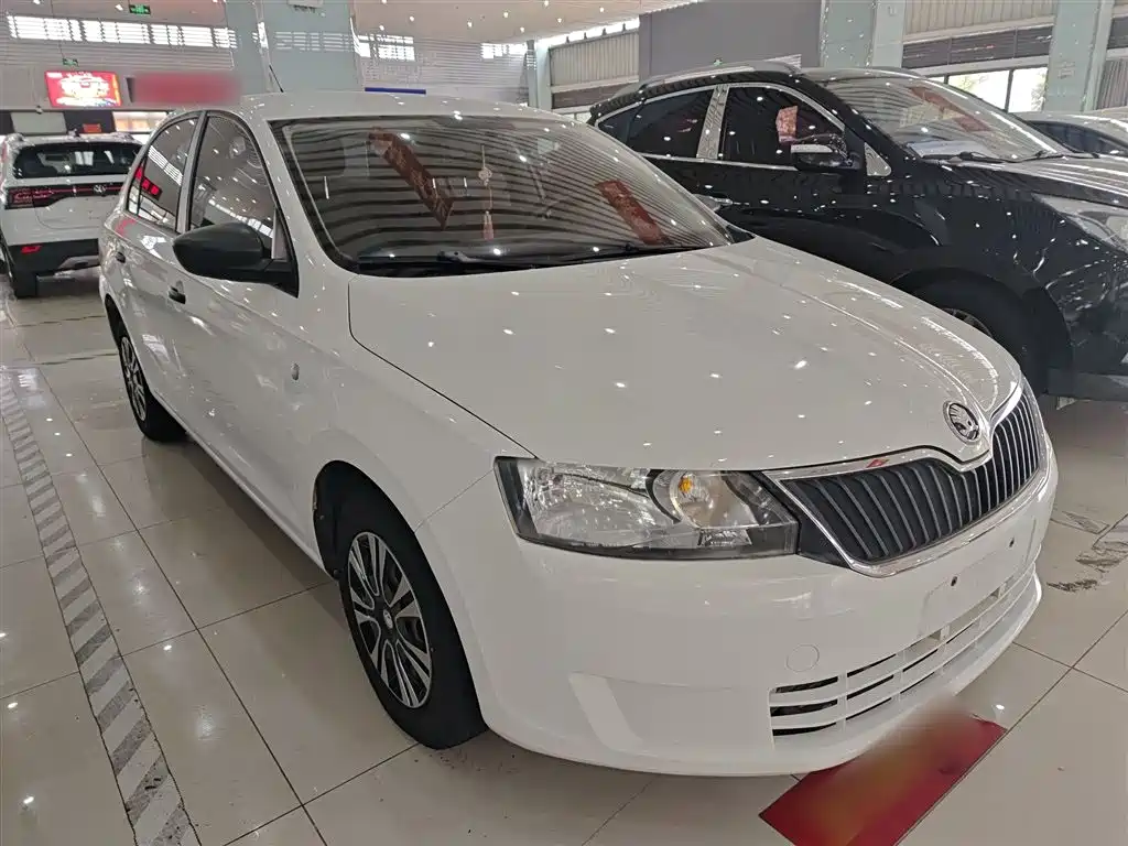 Skoda Rapid 2014 — фото 4