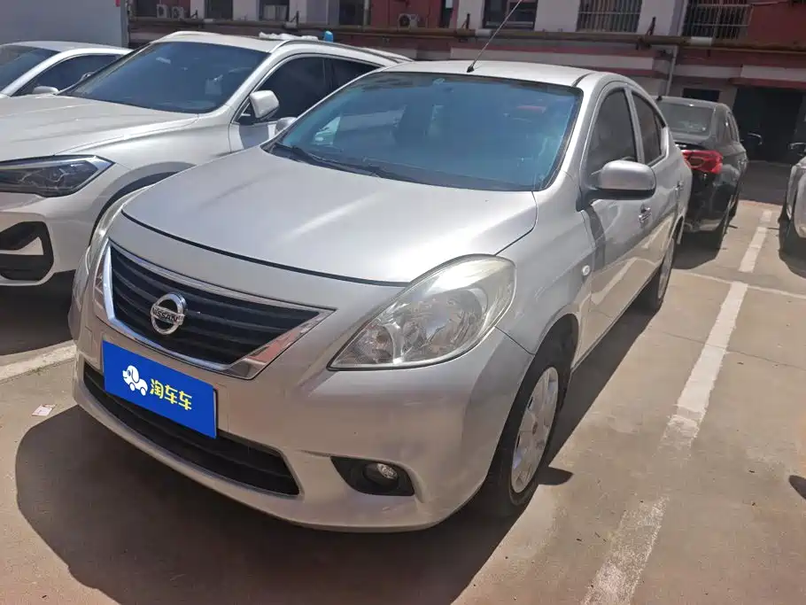 Nissan Sunny 2012 — фото 1