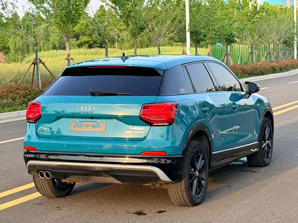 Audi Q2L 2021 — фото 7
