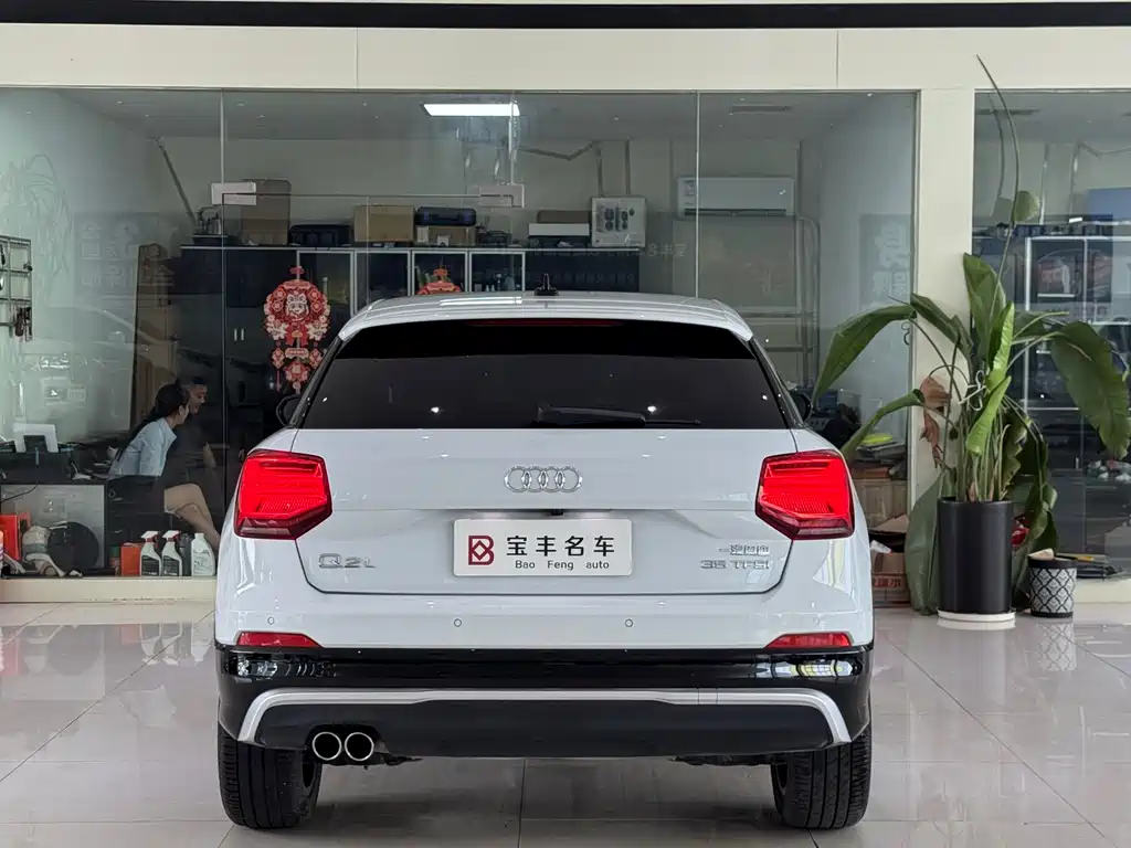 Audi Q2L 2019 — фото 14