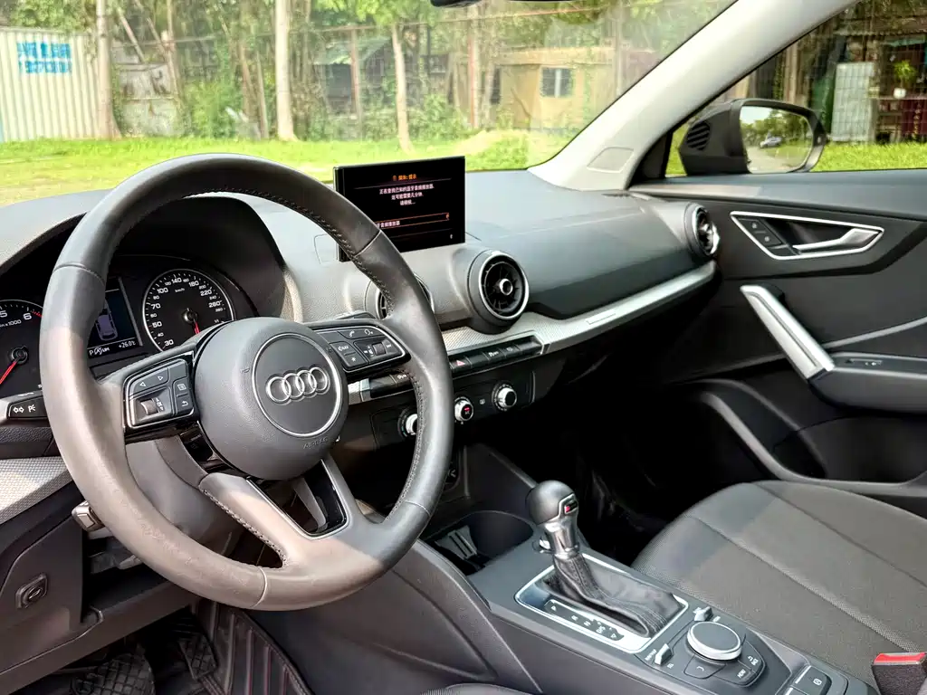 Audi Q2L 2020 — фото 10