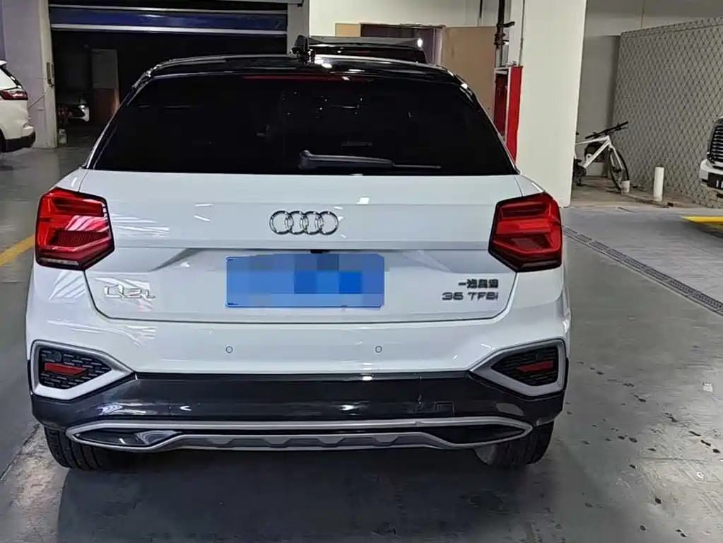 Audi Q2L 2021 — фото 10