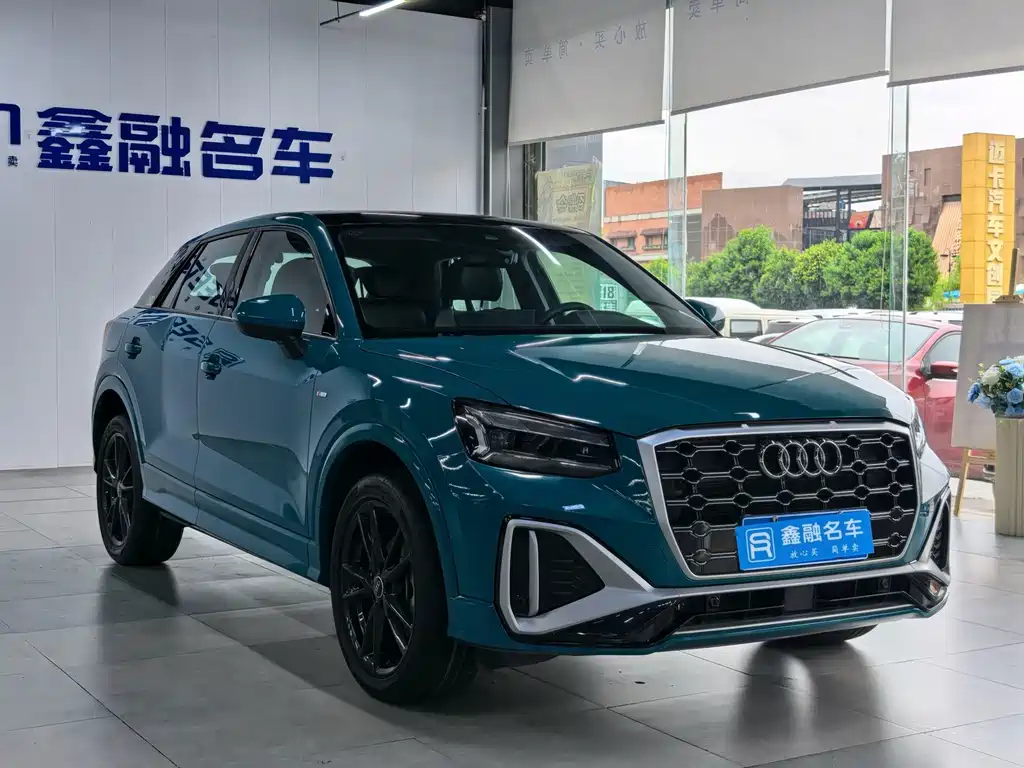 Audi Q2L 2023 — фото 3