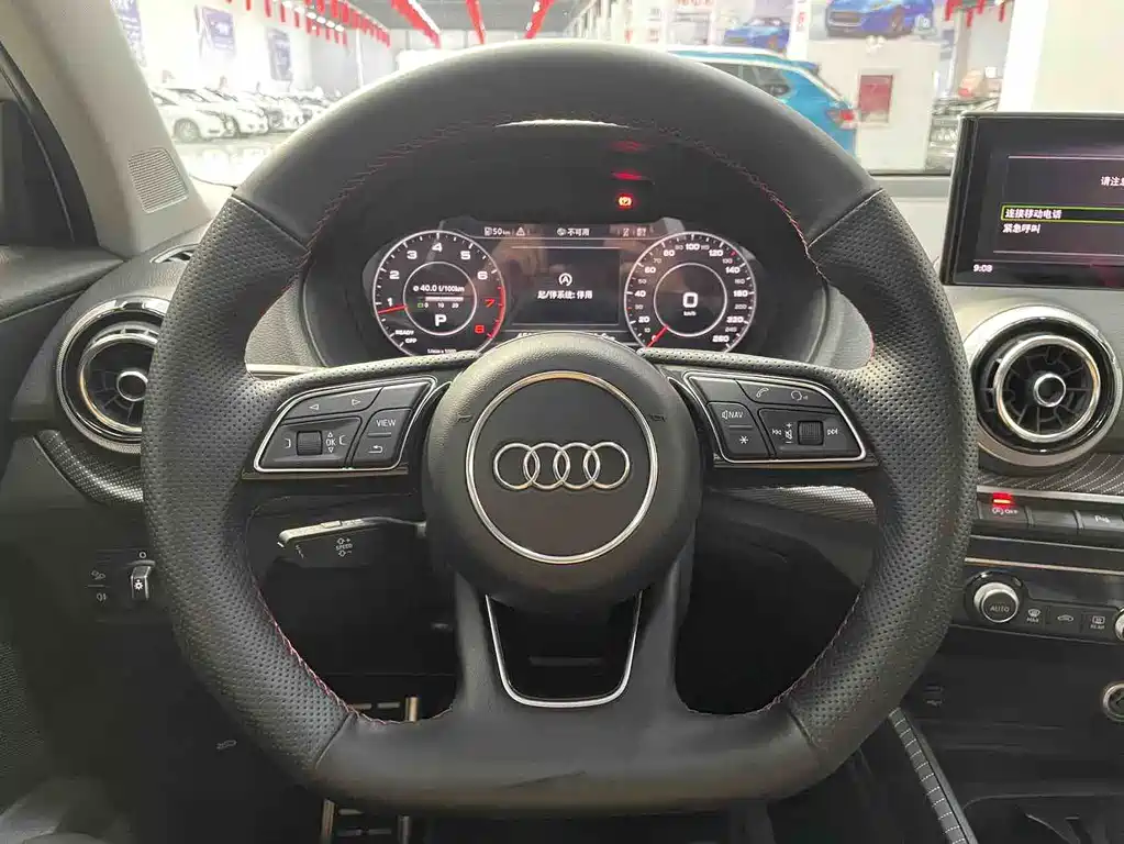 Audi Q2L 2023 — фото 8