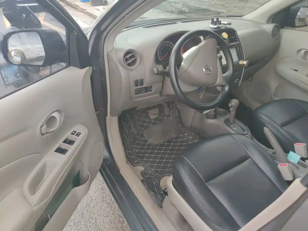 Nissan Sunny 2014 — фото 13