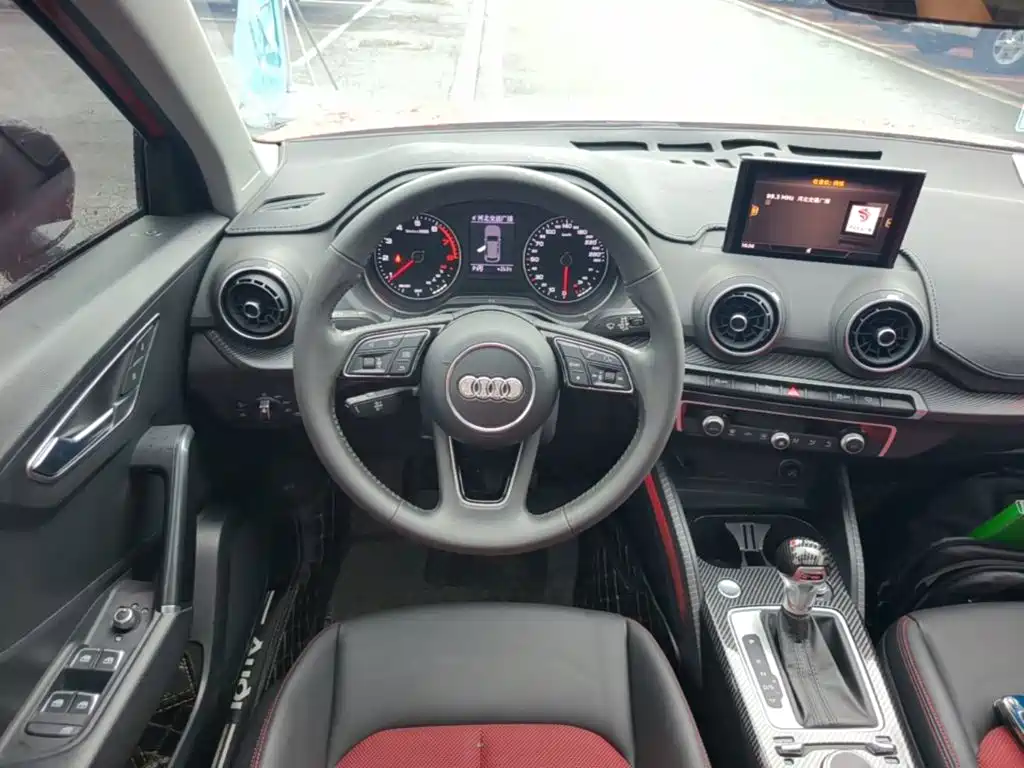 Audi Q2L 2021 — фото 11