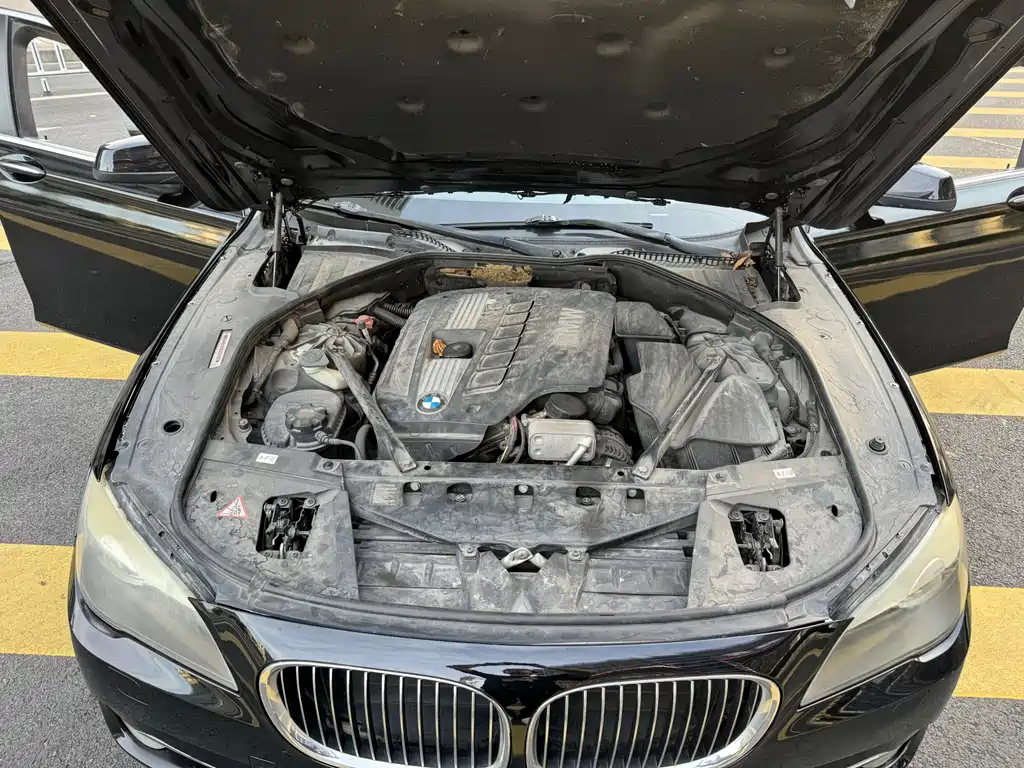 BMW 7 Series 2011 — фото 16