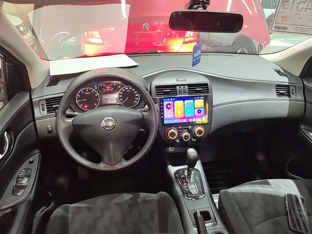 Nissan Tiida 2015 — фото 10