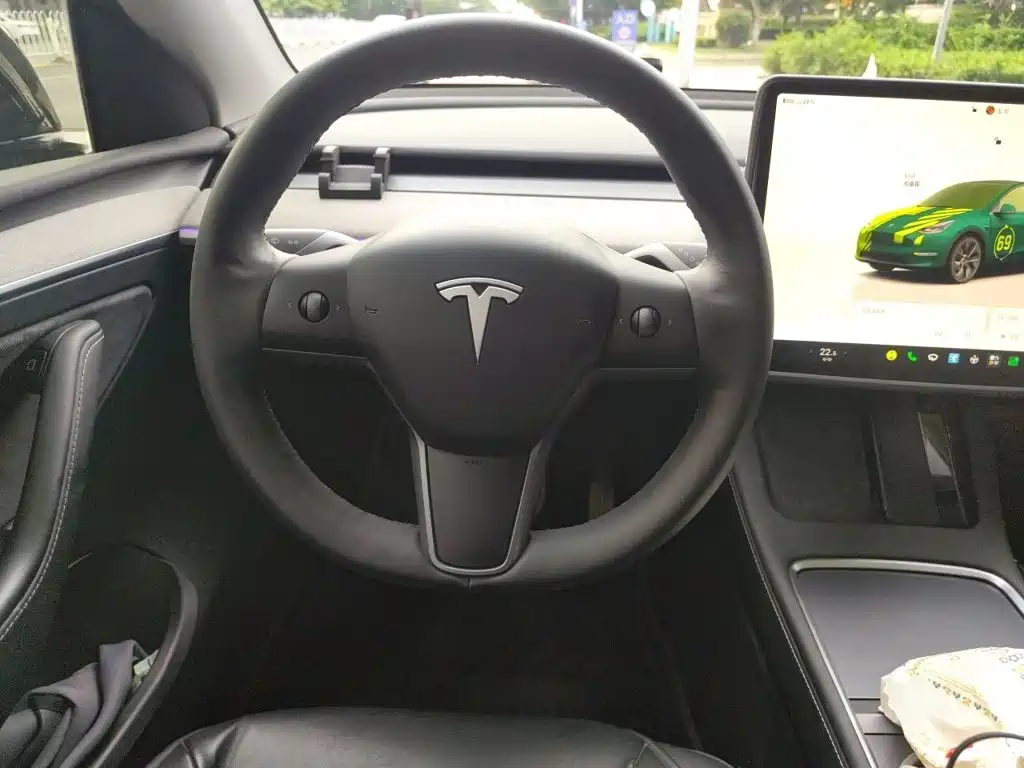 Tesla Model Y 2024 — фото 11