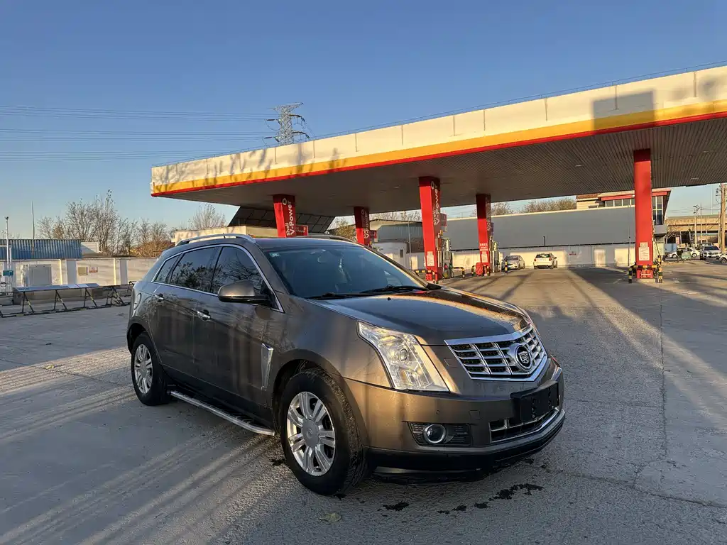 Cadillac SRX 2014 — фото 3