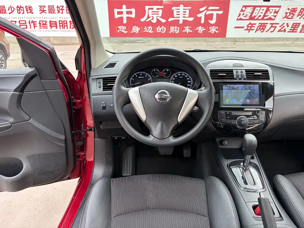 Nissan Tiida 2016 — фото 9