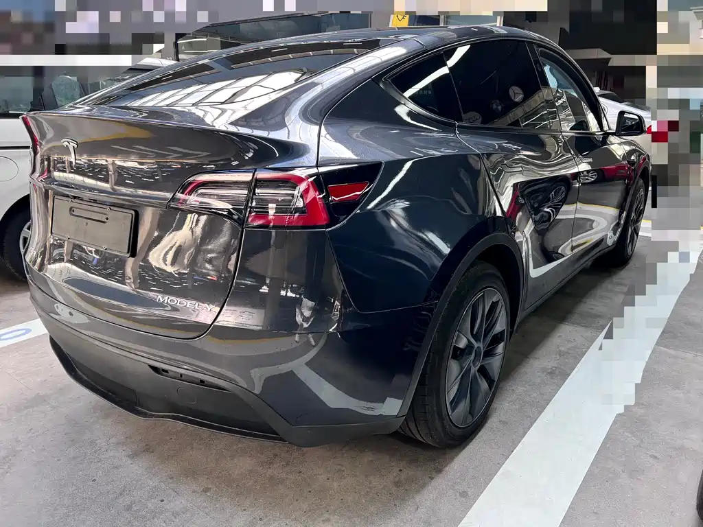 Tesla Model Y 2024 — фото 16