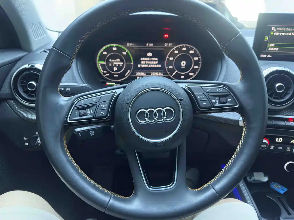 Audi Q2L E-Tron 2023 — фото 11