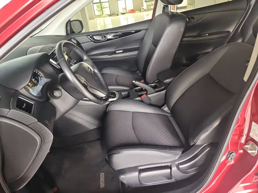 Nissan Tiida 2019 — фото 11