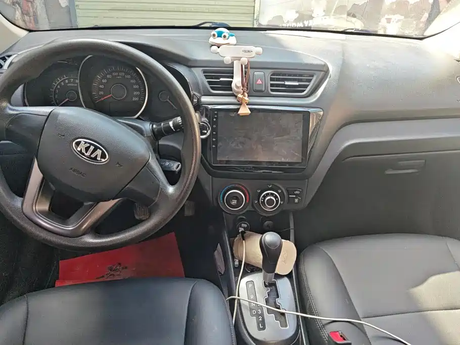 Kia K2 2014 — фото 12