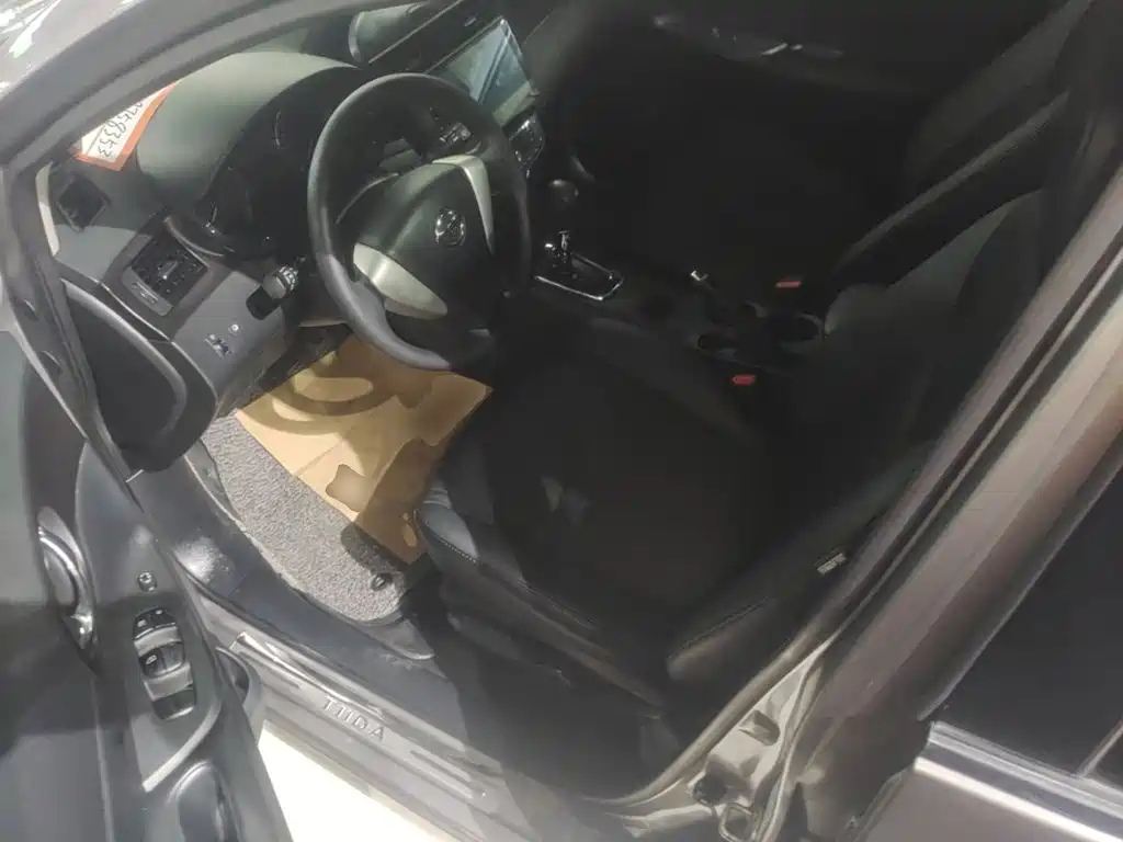 Nissan Tiida 2015 — фото 16