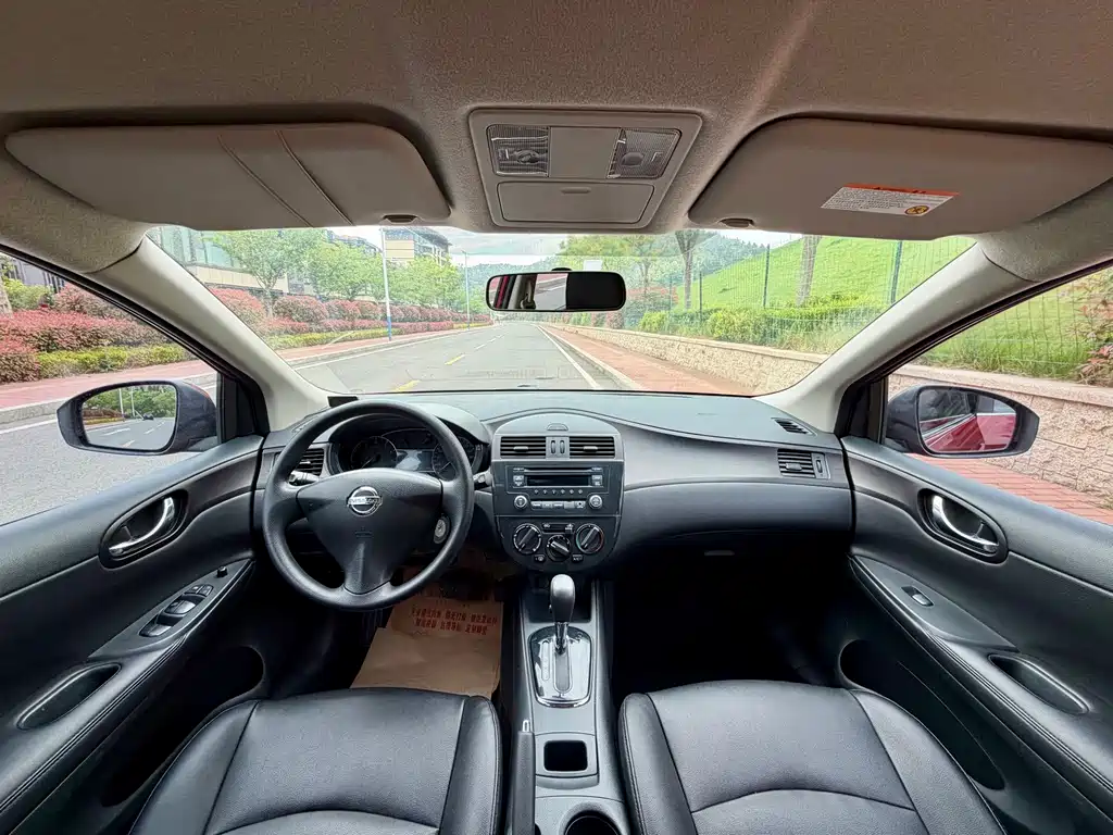 Nissan Tiida 2015 — фото 15