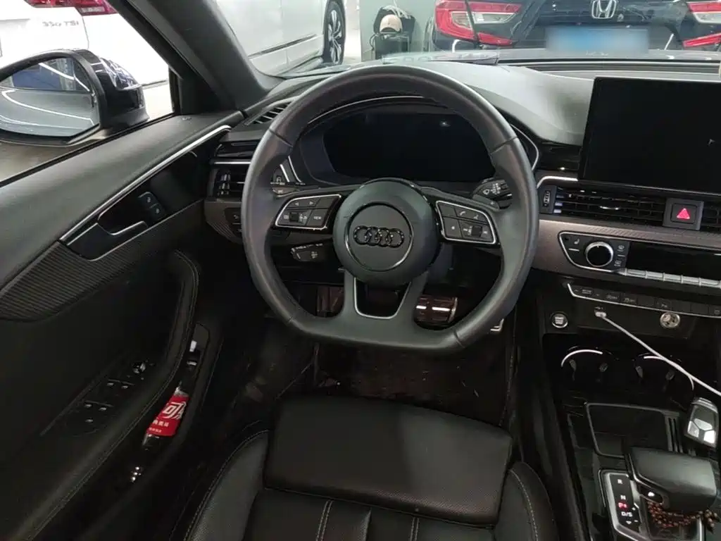 Audi A4L 2023 — фото 11
