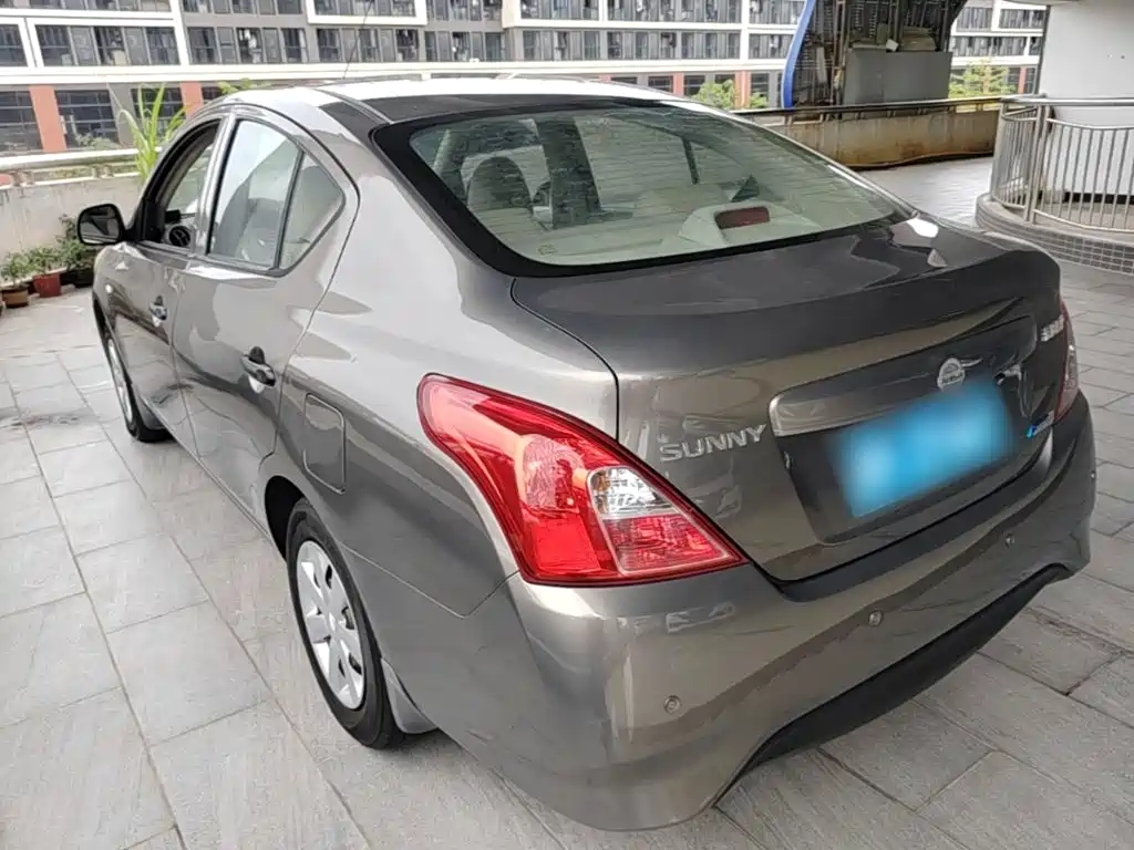 Nissan Sunny 2014 — фото 5