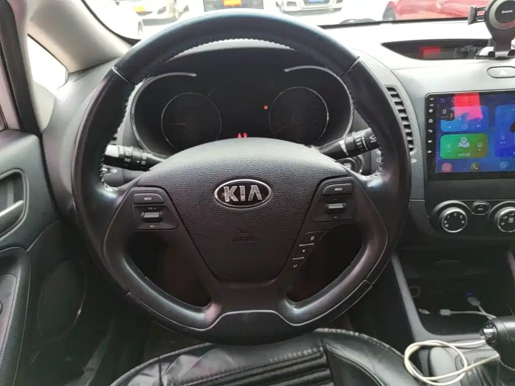Kia K3 2014 — фото 11