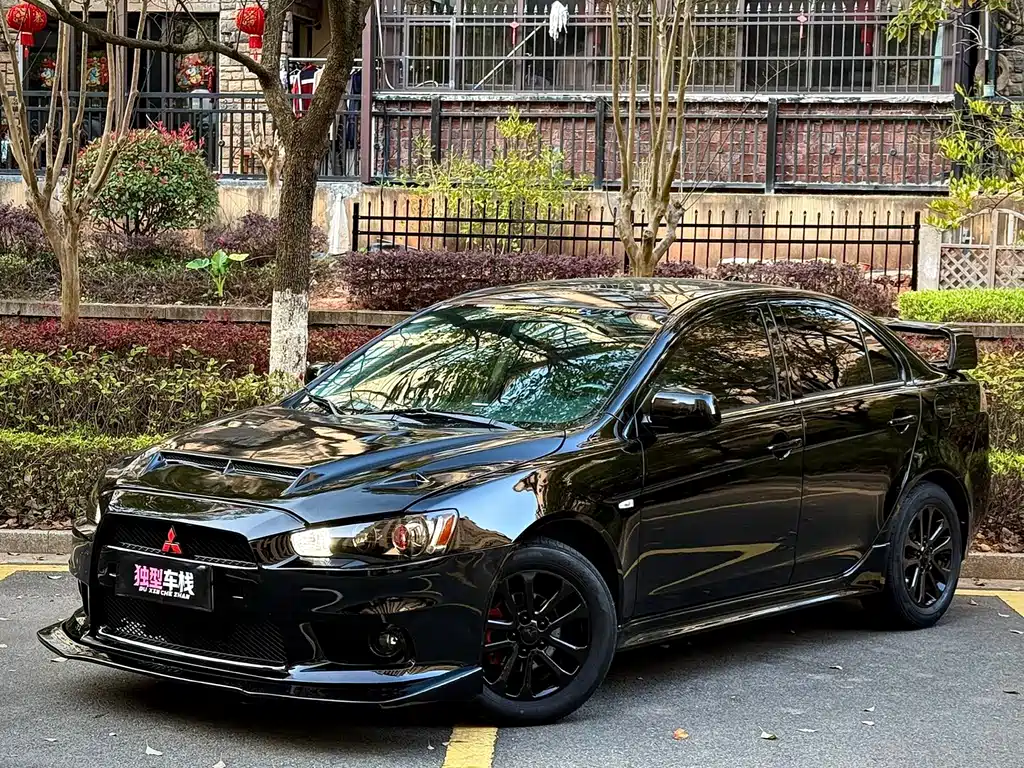 Mitsubishi Lancer EX 2013 — фото 1