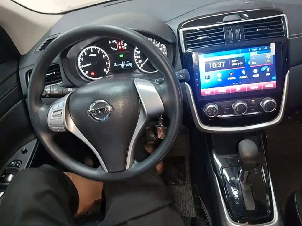Nissan Tiida 2018 — фото 10