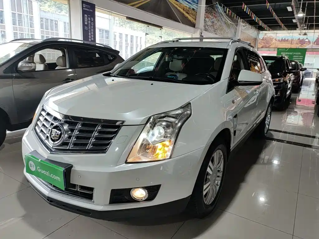 Cadillac SRX 2014 — фото 1